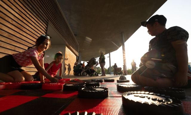 3 people playing checkers