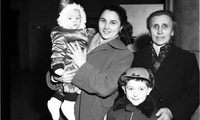 A black and white photo of an Italian immigrant family.