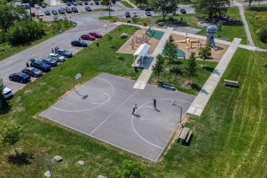 An aerial shot of the playground and basketball court at Downsview Park.