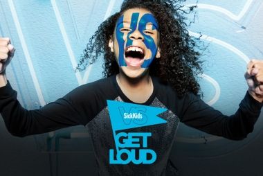 A child with face paint on, promoting Sick Kids Get Loud.