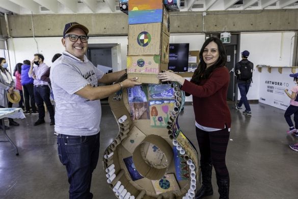 North York Arts' completed upcycled art piece, a giant cardboard guitar.