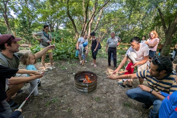 people around a campfire