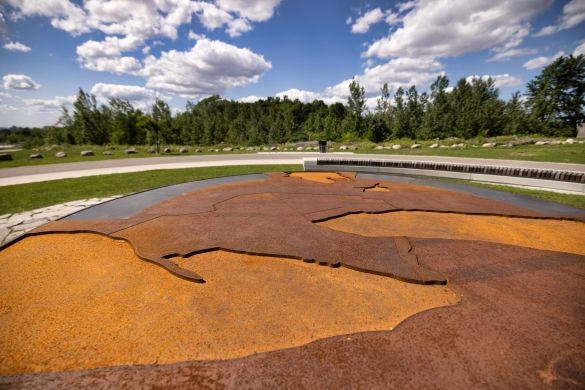 A map etched onto the surface of a corten steel table.